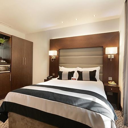 Park Grand London Lancaster Gate Hotel Eksteriør billede A bedroom at the hotel
